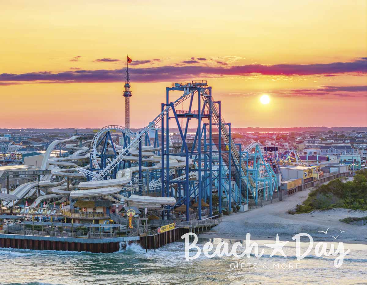 Wildwood boardwalk roller coaster and water park at sunset